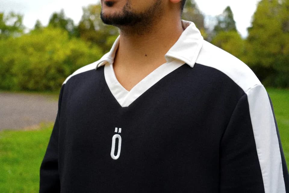 Vintage-style collar detail on 001_the_athlete