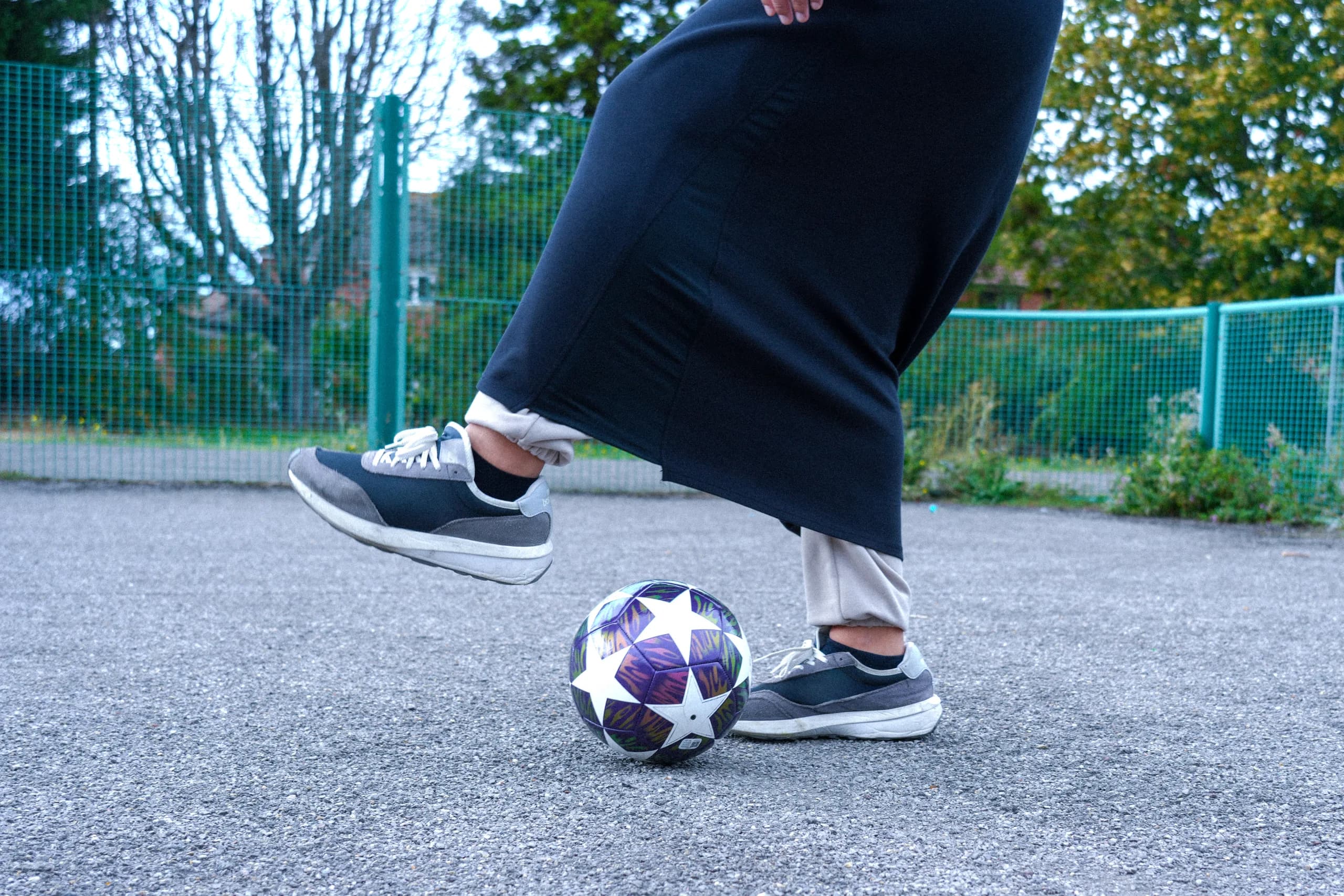001_the_athlete moving with a football