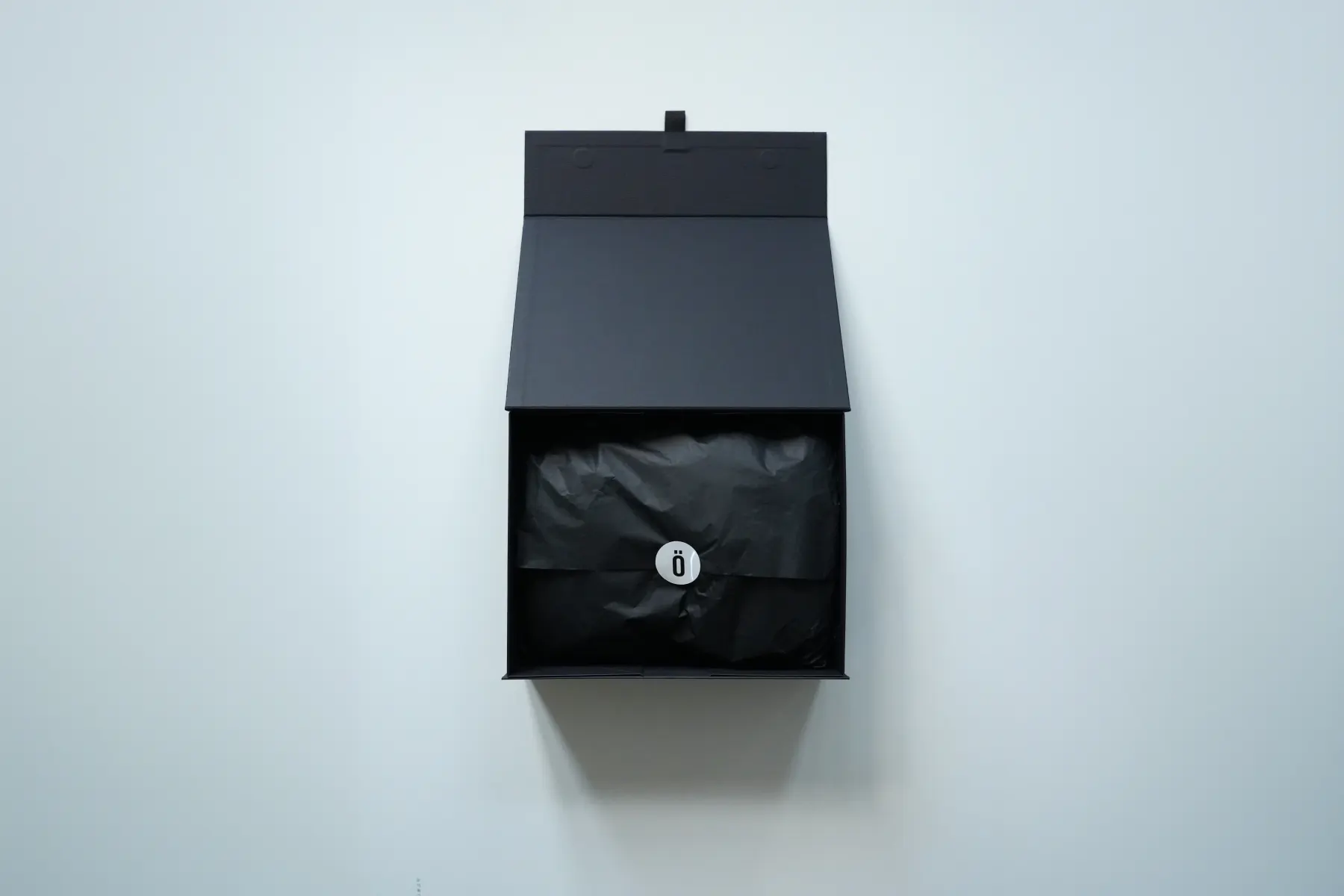 001_the_athlete presented in its matte black box